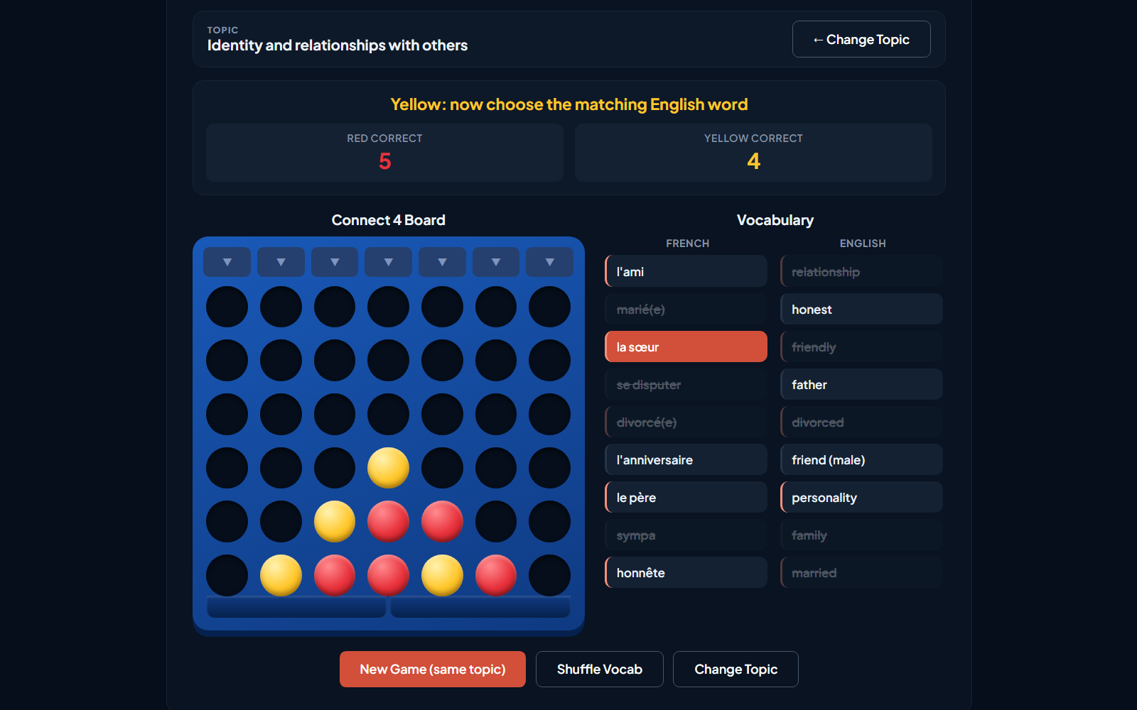 A French Connect 4 game in progress, with the vocabulary list beside the board